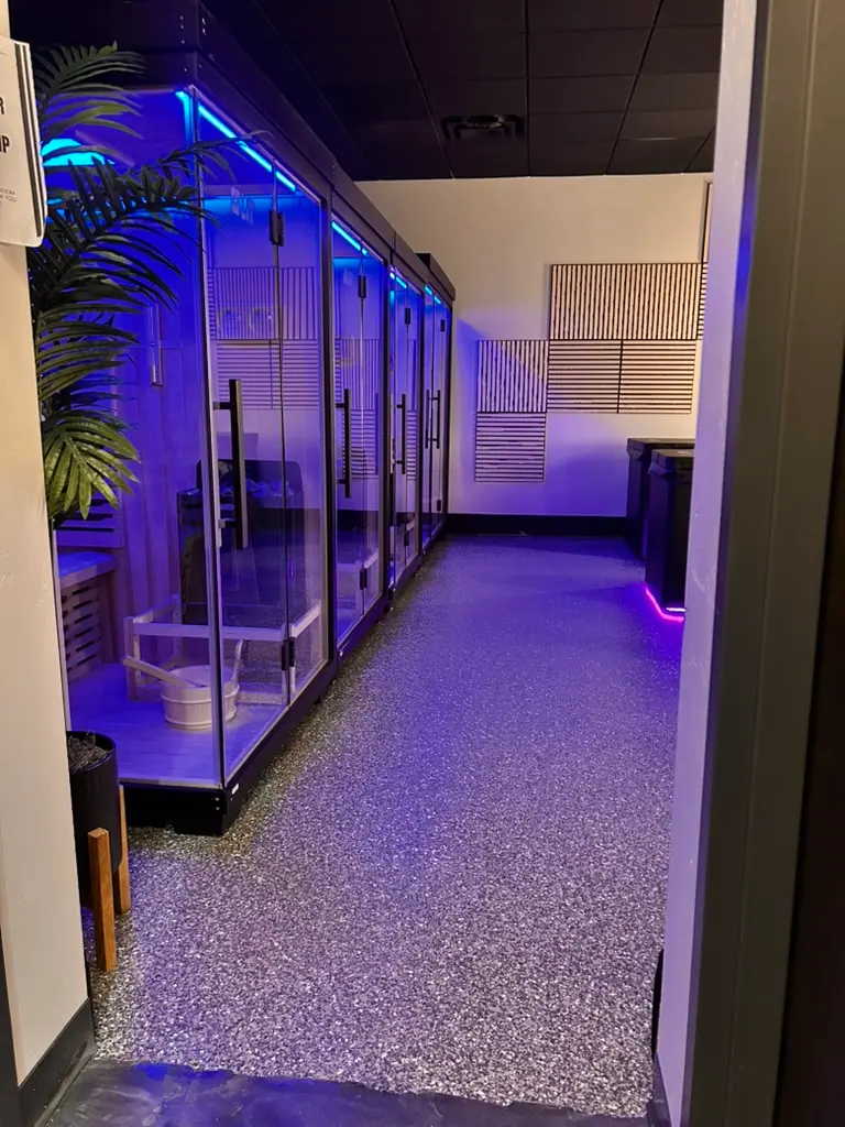 Blue-lit Iron Forge recovery room